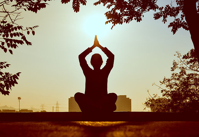 Yoga pose at sunset